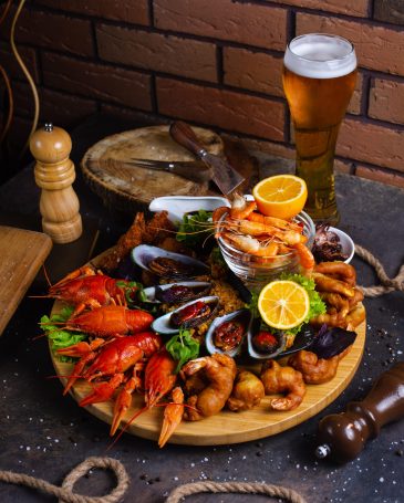 seafood-plate-with-shrimps-mussels-lobsters-served-with-lemon-and-glass-of-beer-min seafood-plate-with-shrimps-mussels-lobsters-served-with-lemon-and-glass-of-beer-min